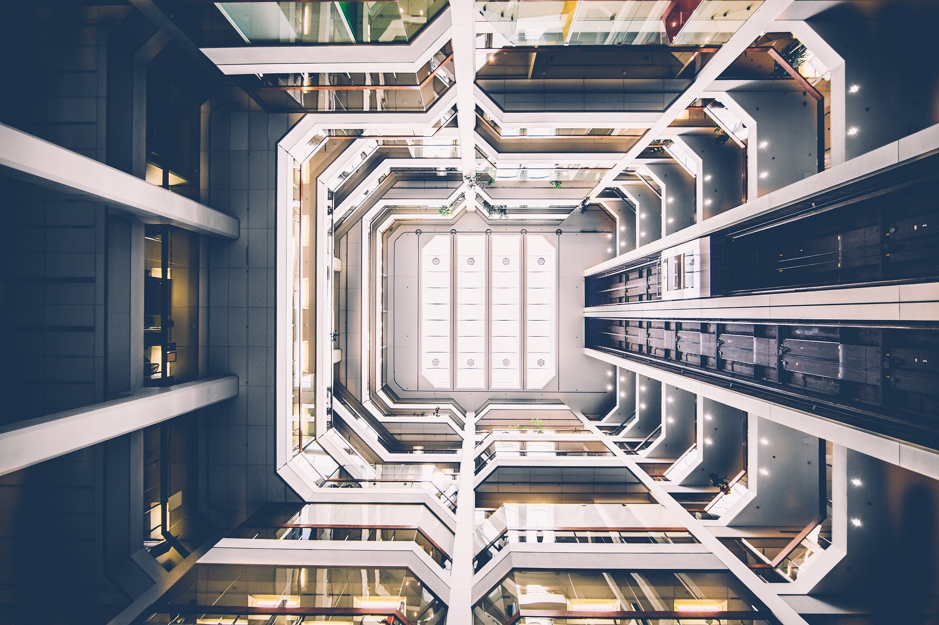 Picture looking up in the middle of an industrial building