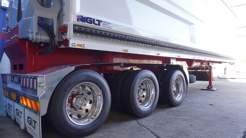 Picture of a big truck with graham luisty trailers branding on it